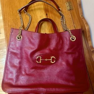 Excellent condition,red Gucci leather shoulder satchel with gold chain handles.